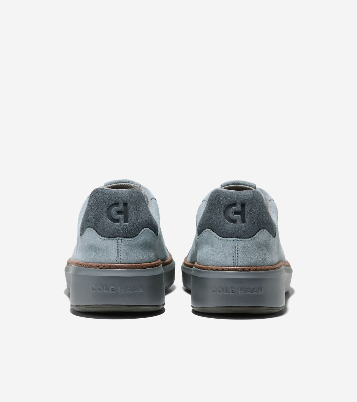 Pair of topspin suede cole haan shoes back view