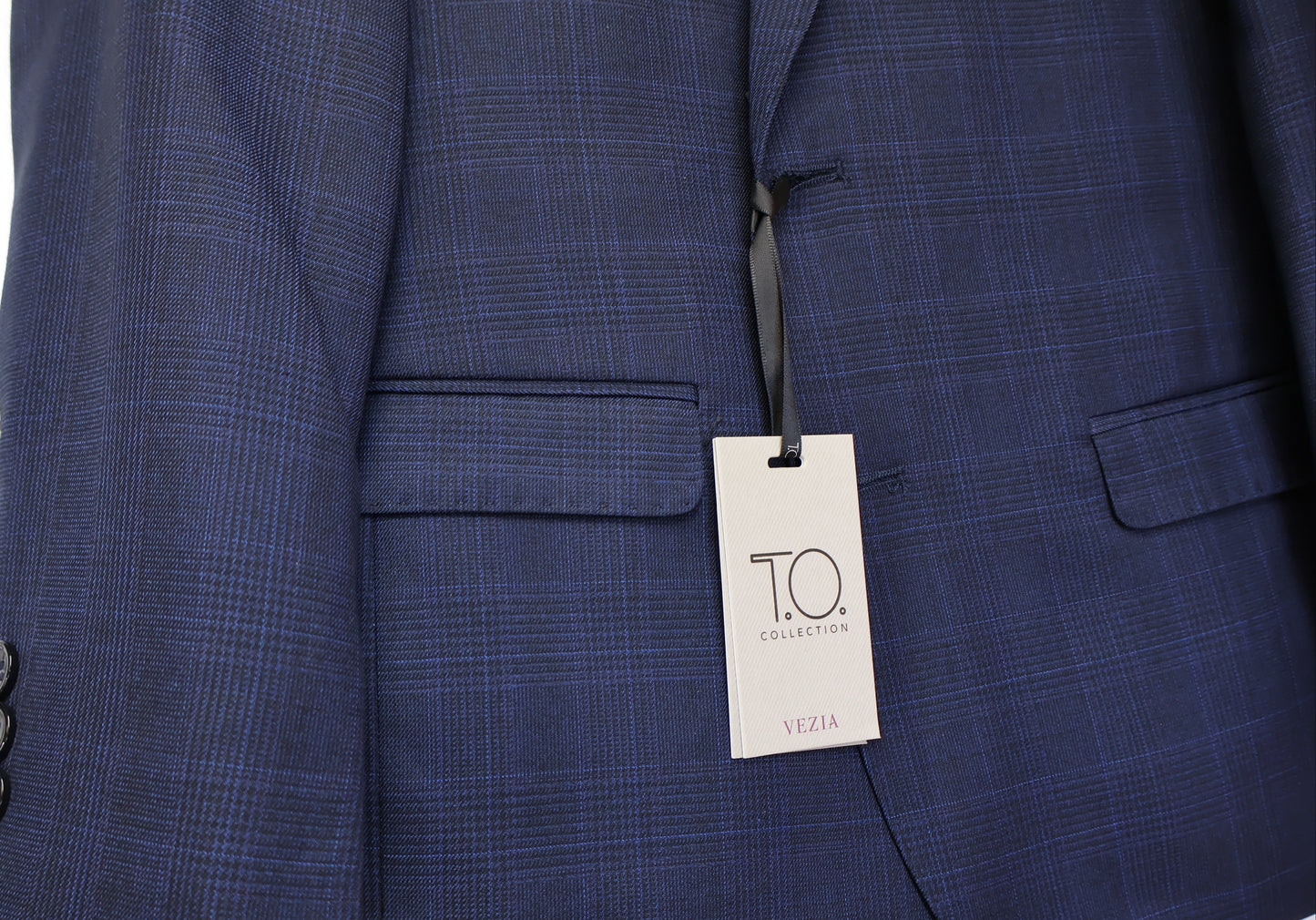 Close-up of T.O. Boys T3A0446 blue-on-navy woven suit fabric and pocket