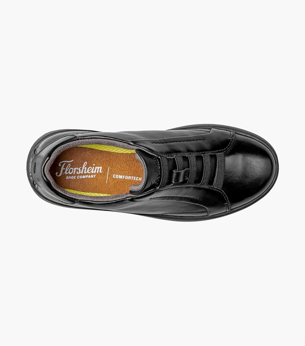A single black leather shoe shown from a top-down view on a light gray background. The shoe features a black leather upper with a black laces and a black sole.