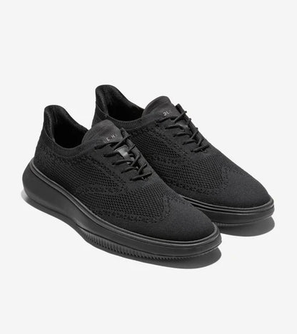 Cole Haan Grand Phaze Laser Quick-On Oxford shoes in black, three-quarter view