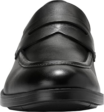 Front view of Cole Haan Newmark Grand loafer with penny keeper detail