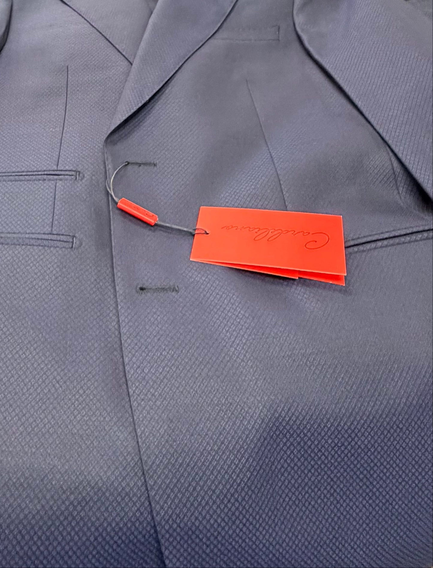 Dark navy suit with mini diamond design besom pockets 