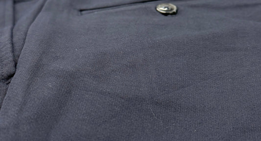 Close-up of navy a6-2 stretch pants 

