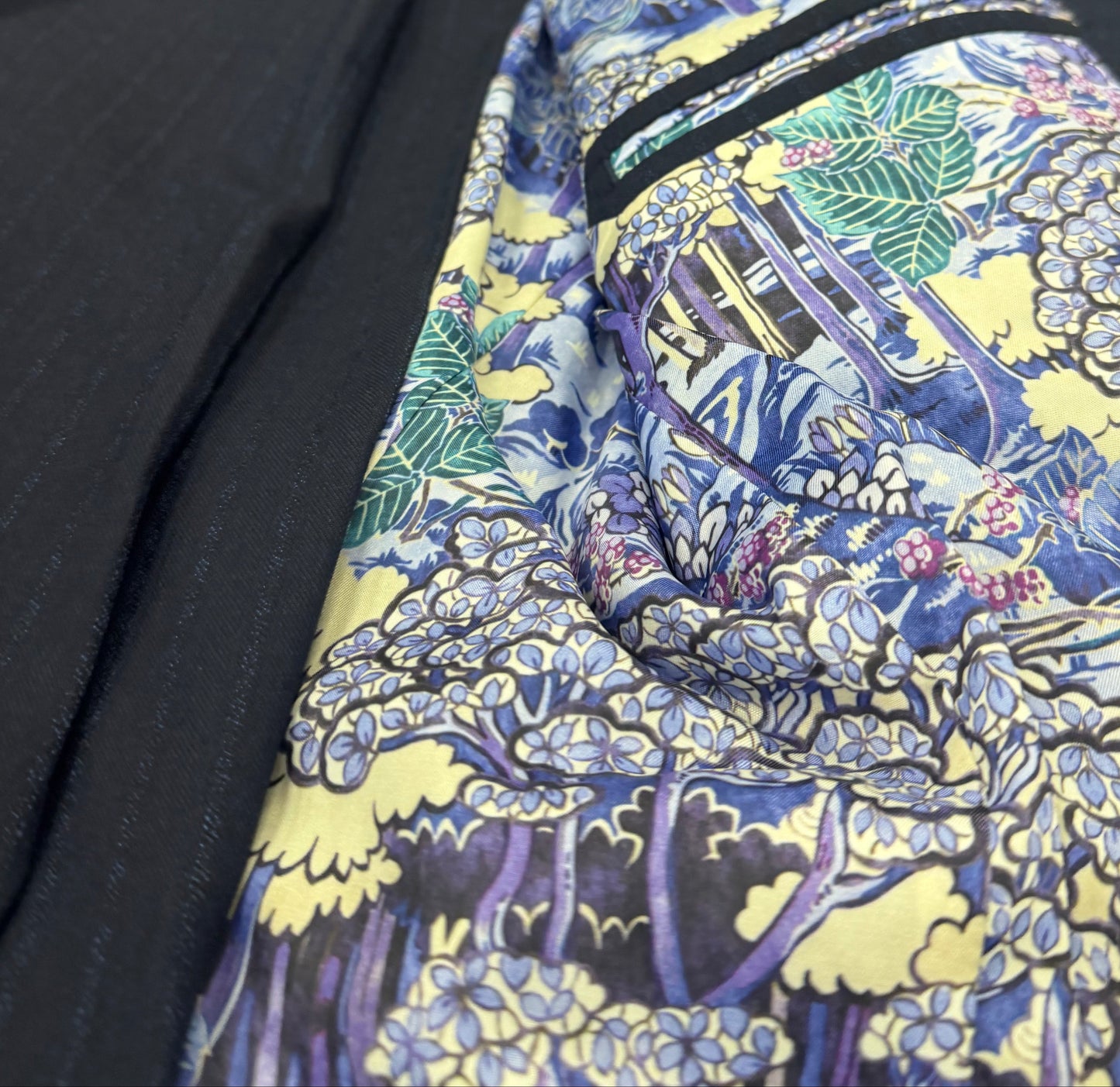 Close up of floral lining of T.O. Black Label boys suit
