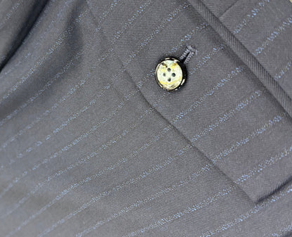 Close up suit pants back pocket button detail navy pinstripe 