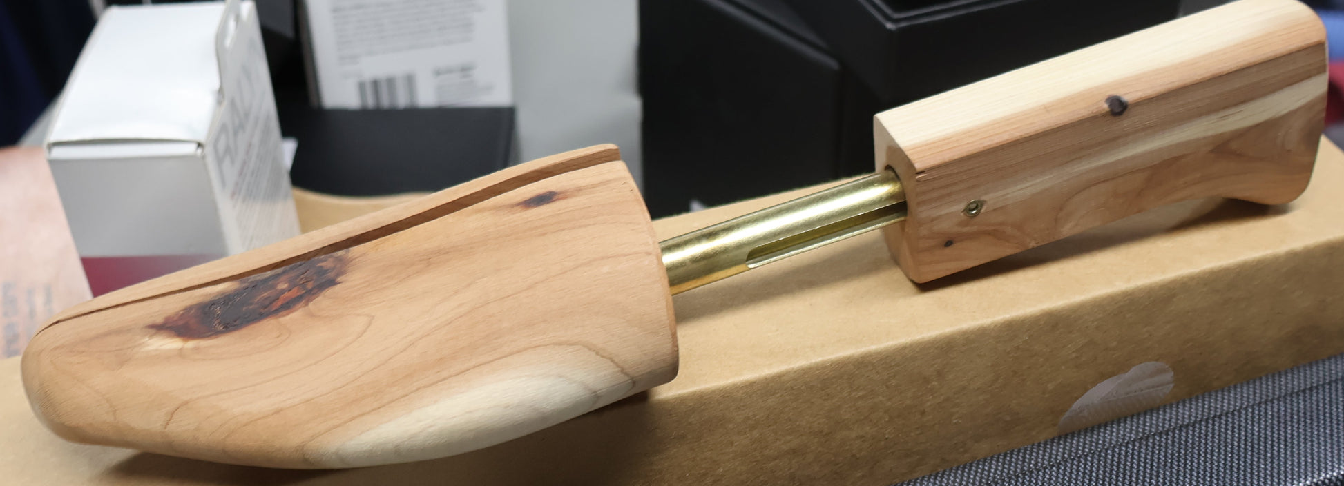 Men’s cedar shoe trees inserted in dress shoes, wooden shoe shaper for maintaining shoe structure