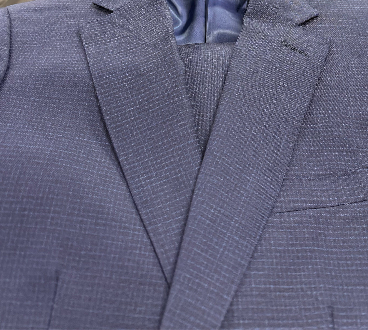 Blue suit jacket close up on the lapels