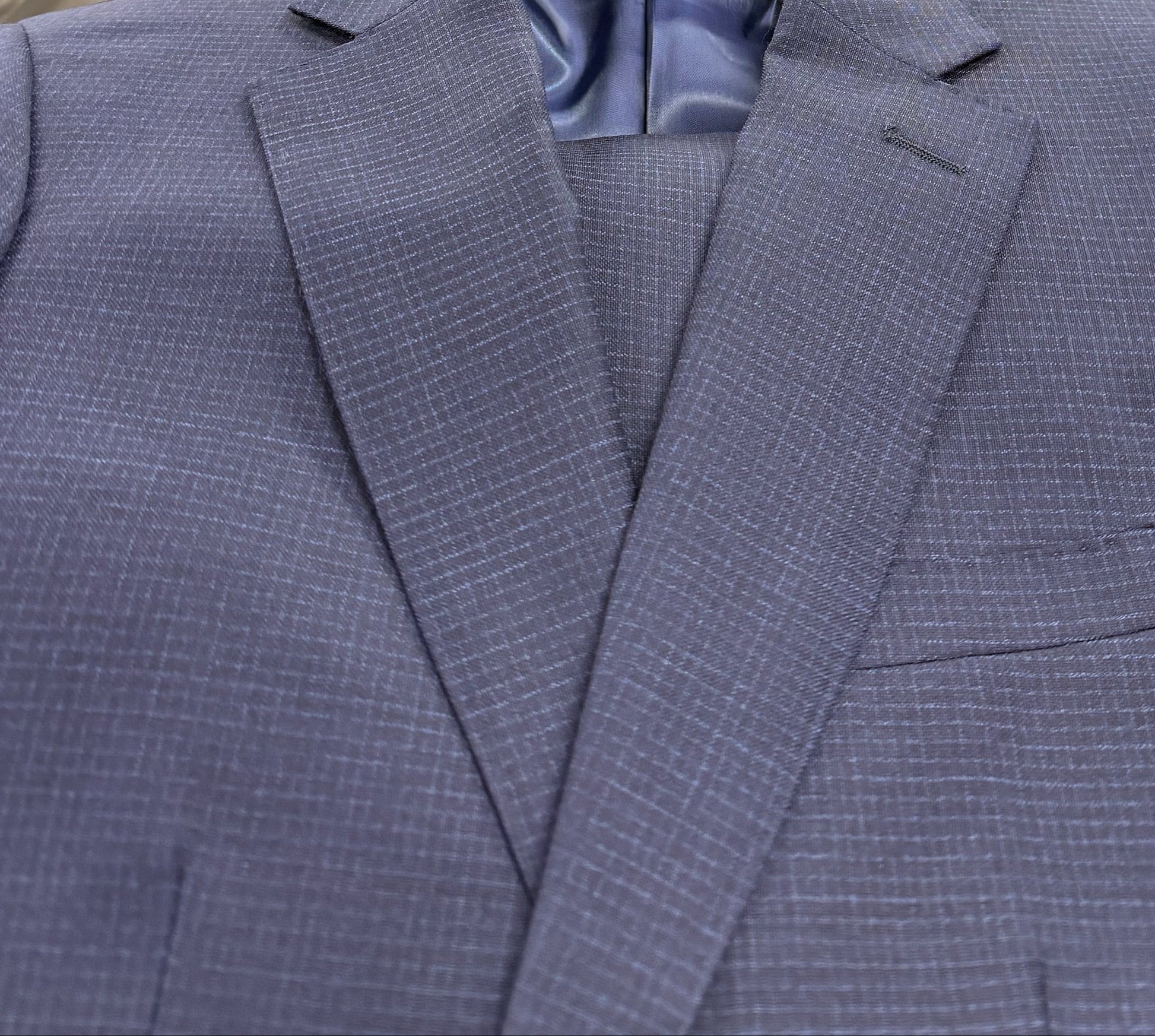 Blue suit jacket close up on the lapels