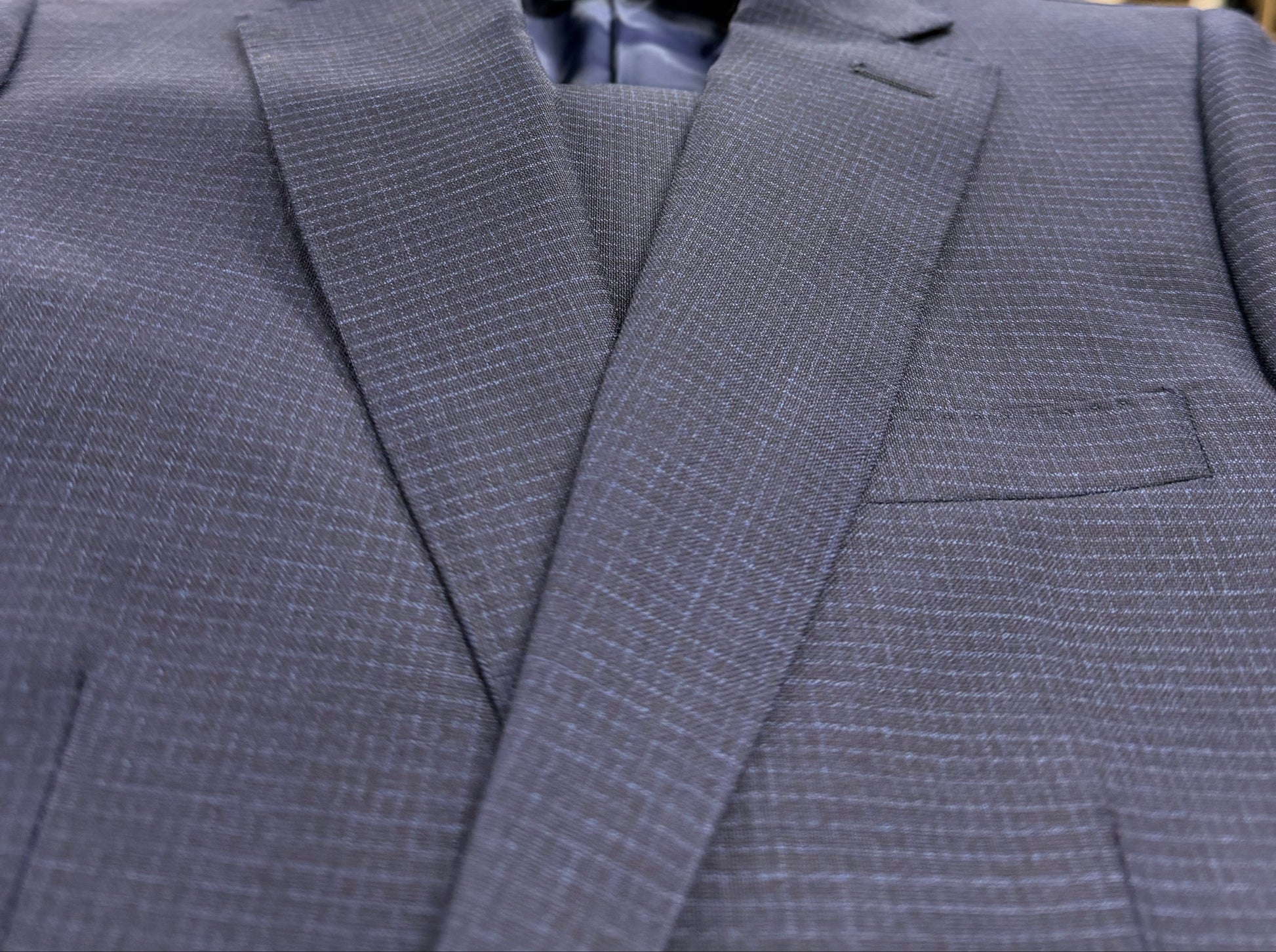 Navy suit jacket with mini checks