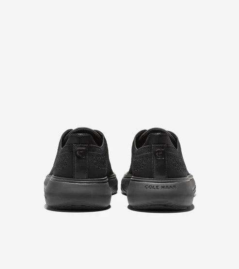Rear view of Cole Haan Grand Phaze Laser Quick-On Oxford shoes in black