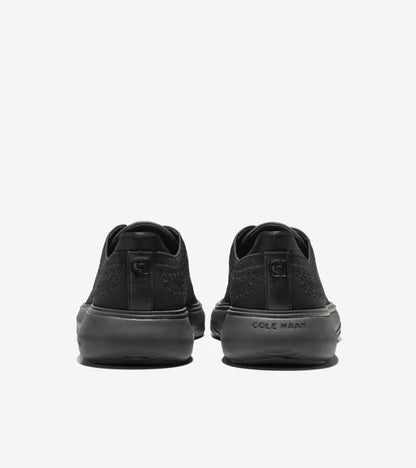 Rear view of Cole Haan Grand Phaze Laser Quick-On Oxford shoes in black