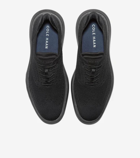 Top view of Cole Haan Grand Phaze Laser black Oxfords with lace-up design