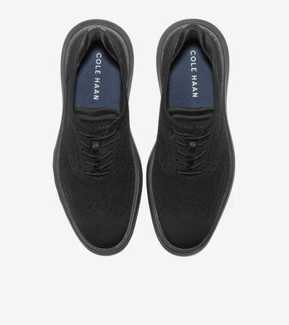 Top view of Cole Haan Grand Phaze Laser black Oxfords with lace-up design
